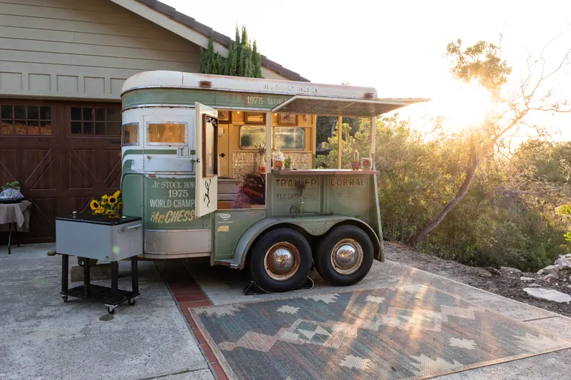 The trailer at sunset with its awning open